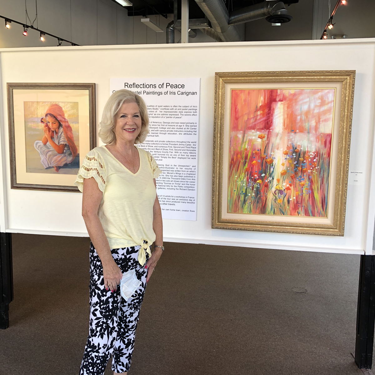 Iris Carignan at the art exhibit.